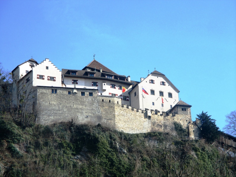history, principality of liechtenstein, built structure, copy space, sky, day, plant, outdoors, blue, no people, clear sky, building exterior, mountain