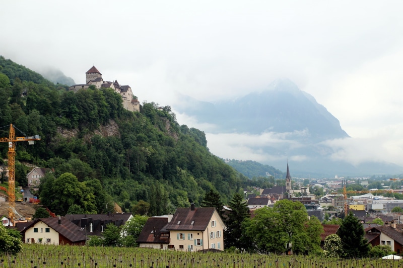 Liechtenstein, roof, architecture, residential district, outdoors, Vaduz, city, mountains, belief, nature, home, built structure, landscape., sky, the city
