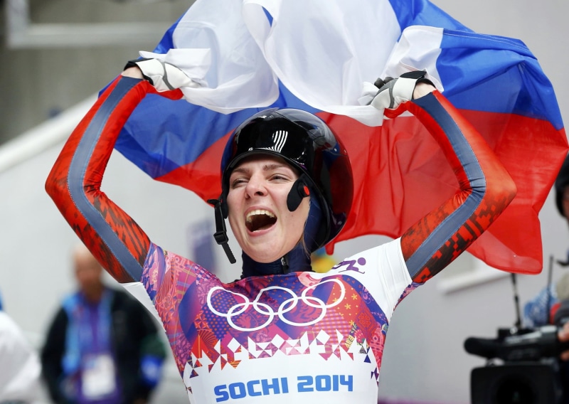 mouth open, lifestyles, holding, Sochi 2014, happiness, text, helmet, liechtenstein, sochi, one person, western script, 1080P, real people, clothing, outdoors