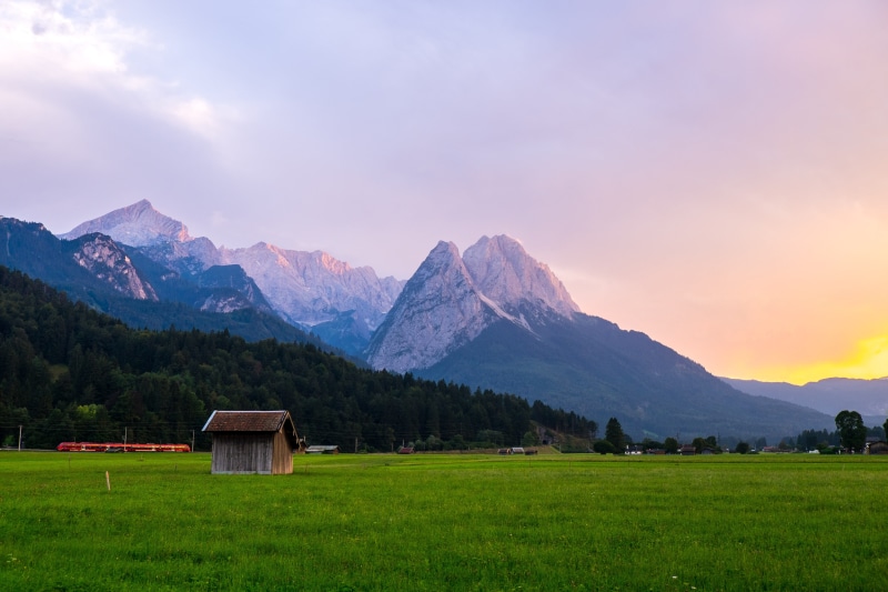 europe, field, architecture, travel, plain, nature, beauty in nature, dusk, tranquil scene, sky, 4K, grass, land, outdoors, meadow, zugspitze, environment