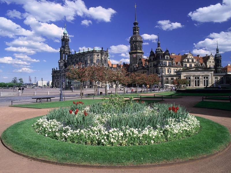 travel destinations, nature, day, building exterior, outdoors, grass, sky, history, garden, architecture, spire, plant, government, flowerbed, ornamental garden