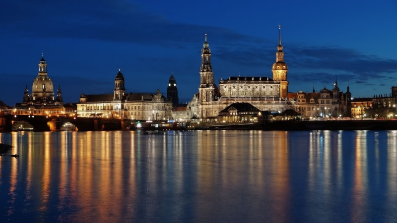 clouds, building exterior, tourism, no people, river, religion, architecture, built structure, nature, reflection, building, cathedral, evening, city, church