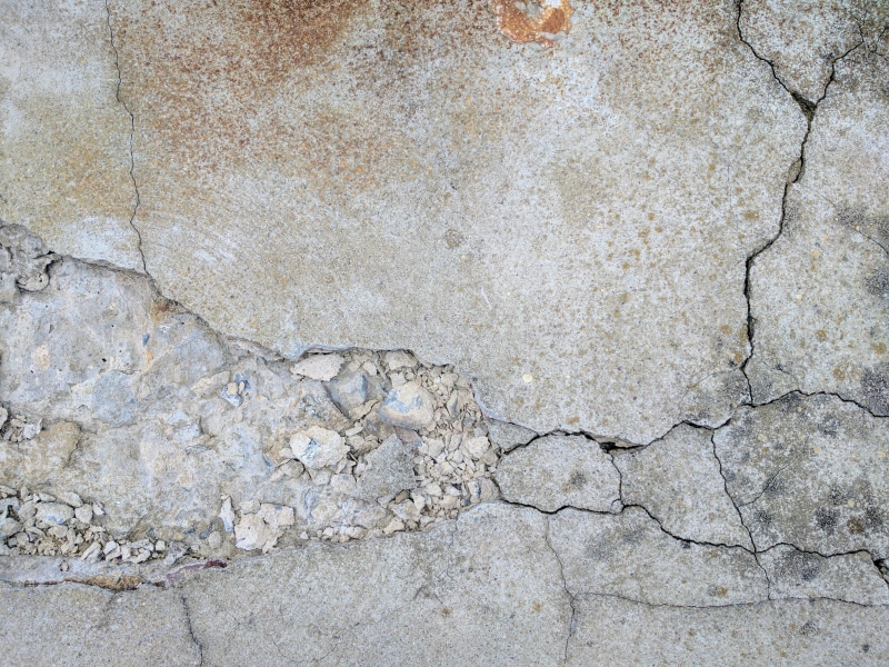 wall - building feature, backgrounds, industrial, surface, beige, cracked, textured, stone material, day, cement, grunge, abstract backgrounds, full frame
