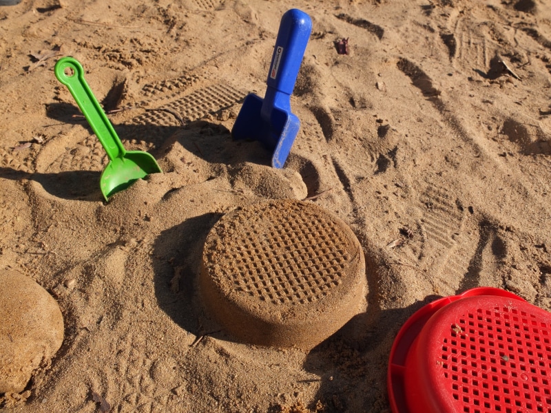 nature, container, green color, day, high angle view, vacations, hand tool, land, sand pail and shovel, play, toy, sieve, shovel, still life, sandalwood