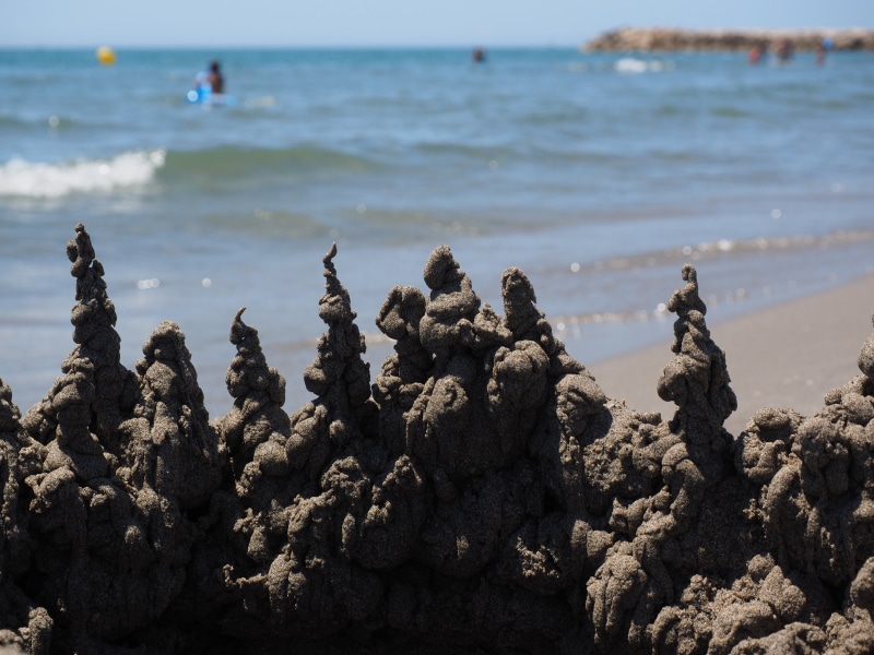 sandburg, sky, sea, holiday, water, focus on foreground, summer, solid, sand artwork, beach, towers, rock, drip castle, artwork, beauty in nature, horizon over water