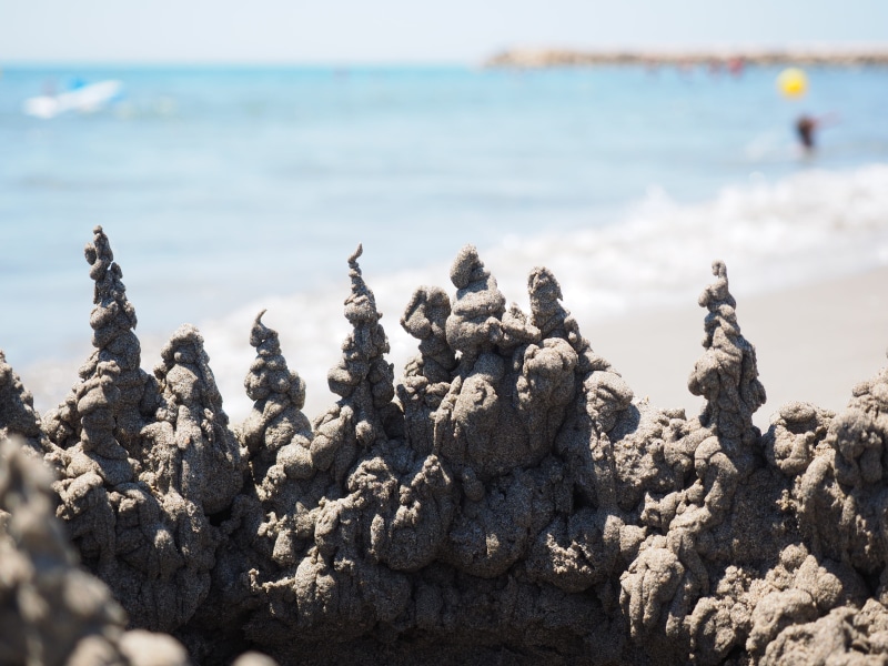 horizon over water, water, sea, beauty in nature, focus on foreground, sunlight, drip castle, towers, beach, no People, artwork, scenics - nature, Castle
