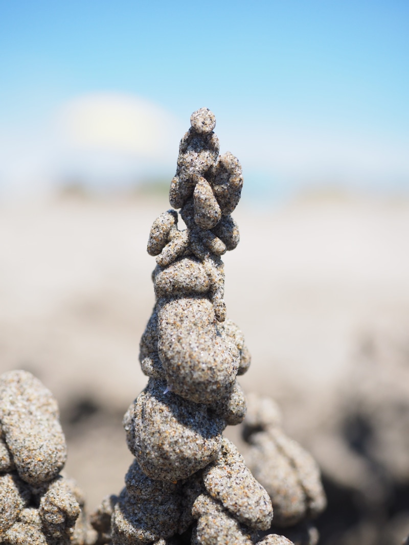 outdoors, no people, Castle, klecker castle, artwork, droplets burg, Tower, drip castle, land, sand artwork, sand, stone - object, sky, focus on foreground