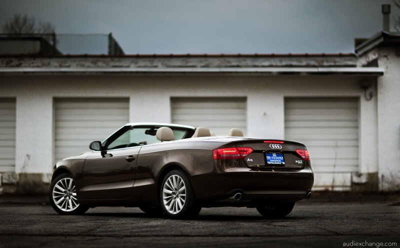land vehicle, mode of transportation, teak, a5, audio, roadster, vintage car, cabriolet, built structure, outdoors, no people, focus on foreground, building
