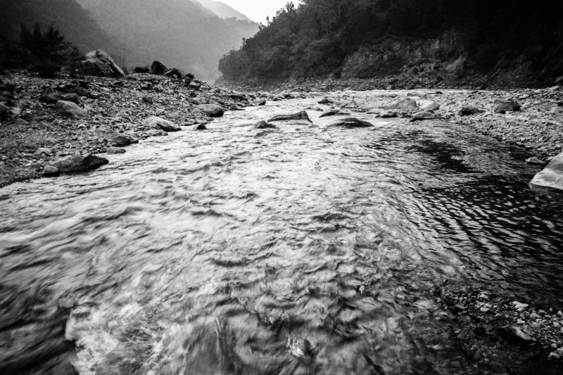 solid, river, rippled, rock - object, tranquil scene, scenics - nature, ganges, dark, waterfront, flowing water, water, day, tributary, beauty in nature