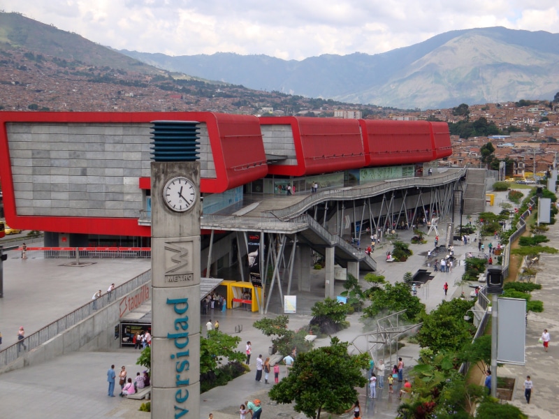 Parque Explora, street, mode of transportation, nature, motor vehicle, day, high angle view, land vehicle, architecture, mountain, hills, transportation