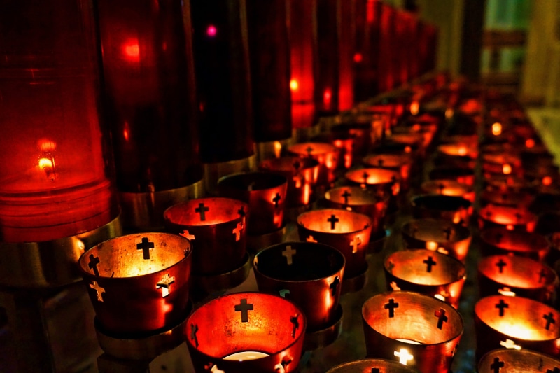spirituality, flame, tea light, no people, burning, architecture, building, built structure, nightlife, large group of objects, illuminated, united states