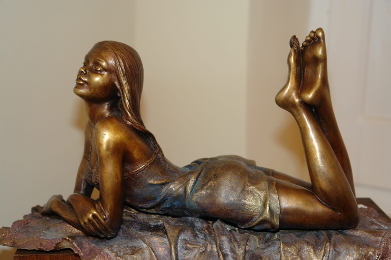 tourism, laying, culture, gold colored, history, historic, table, brass, studio shot, still life, creativity, figurine, dress, human representation, chair