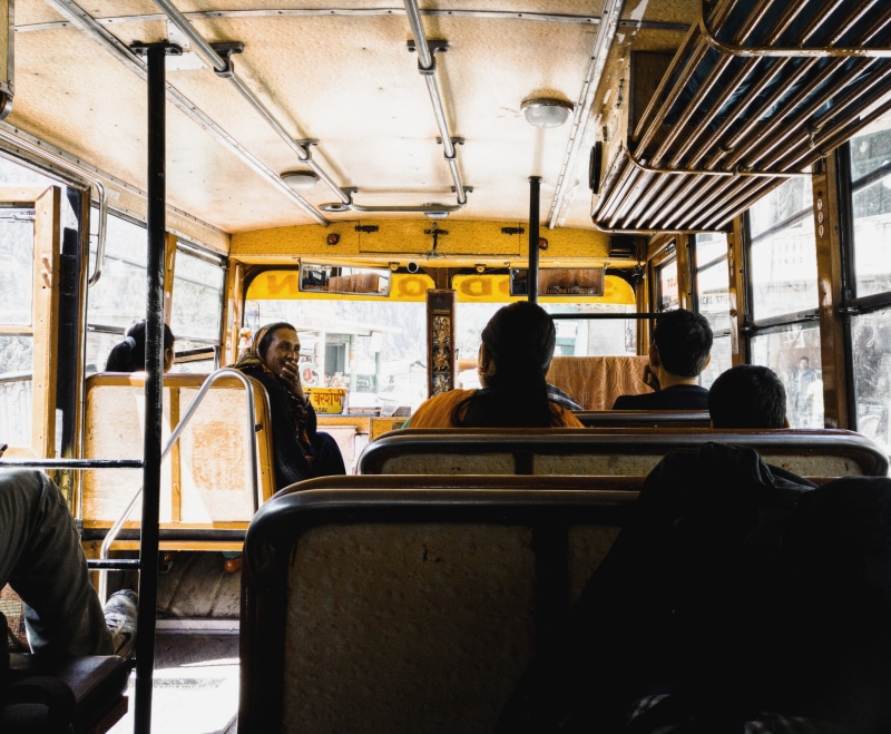 4K, daytime, rear view, public transportation, group of people, men, women, indium, adult, window, vehicle interior, inside, smile, transportation, bus