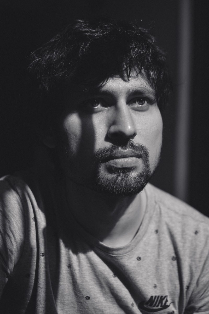 casual clothing, looking at camera, crew, bnw, headshot, one person, young men, young adult, men, portrait, hairstyle, photography, upward, human face