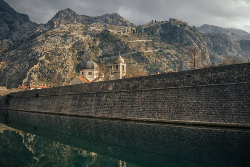 midevel, water, ruins, sky, travel destinations, the past, wall, ancient, history, cloud - sky, ortodox, montenegro, mountain peak, mountain range, built structure