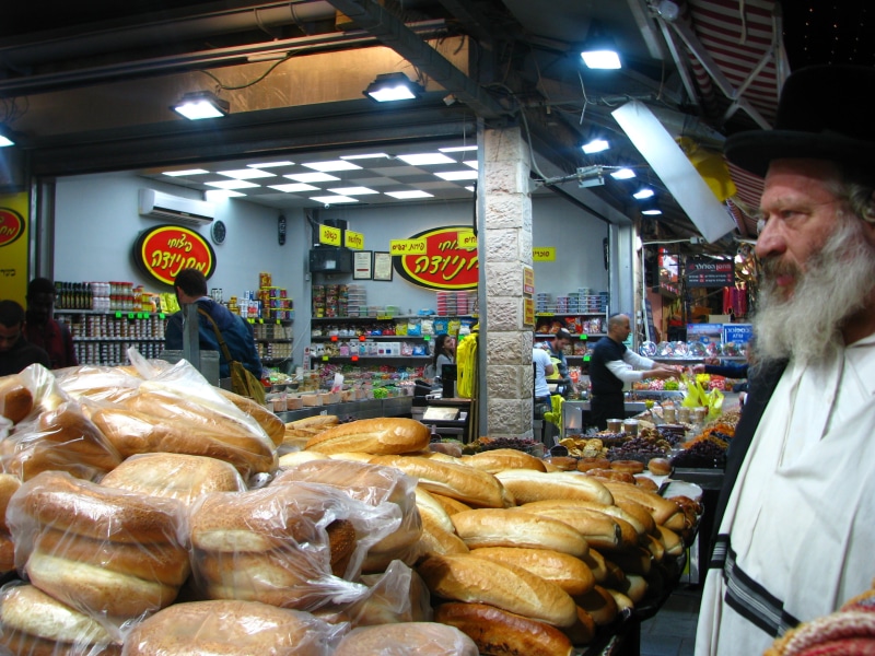 adult, one person, retail, small business, 2K, occupation, store, architecture, shopping, food, street, market, illuminated, bread, freshness, incidental people