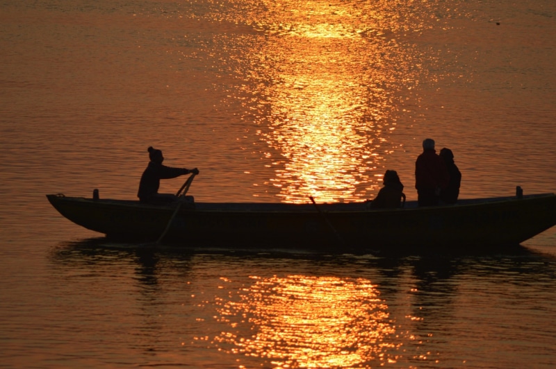 sea, orange color, 1080P, lifestyles, india, hindu, reflection, real people, silhouette, asia, religion, outdoors, boat, water, beauty in nature, sky