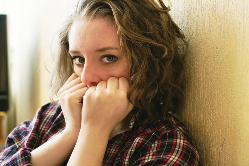 person, headshot, hair, contemplation, filled with fear, scared, child, real people, teenager, casual clothing, one person, emotion, young women, afraid