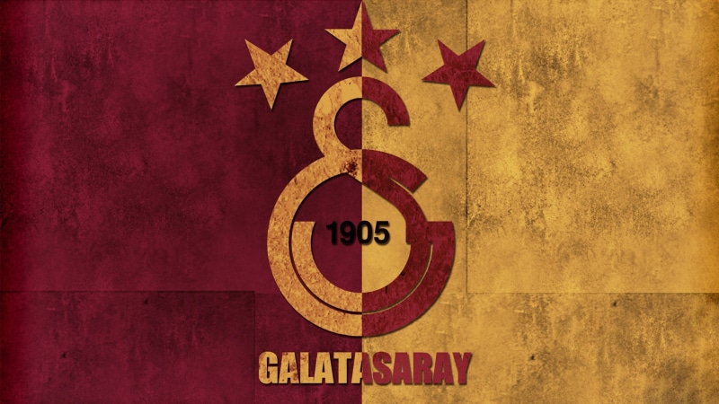 retro styled, outdoors, soccer clubs, dirt, full frame, star shape, symbol, red, text, weathered, day, Turkish, yellow, no people, shape, Galatasaray S.K.