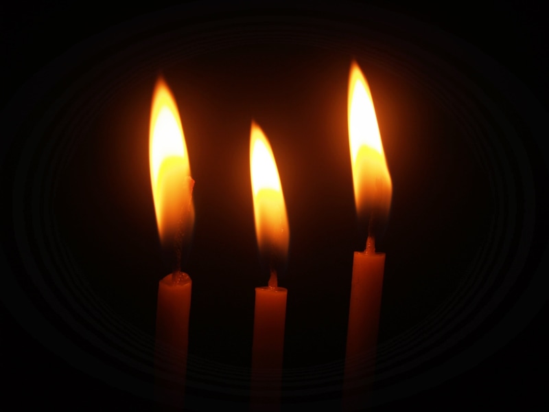 religion, beam, fire, ceremony, flame, indoors, heat - temperature, holiday, spirituality, heat, glow, glare, night, single object, closeup, holy, nature