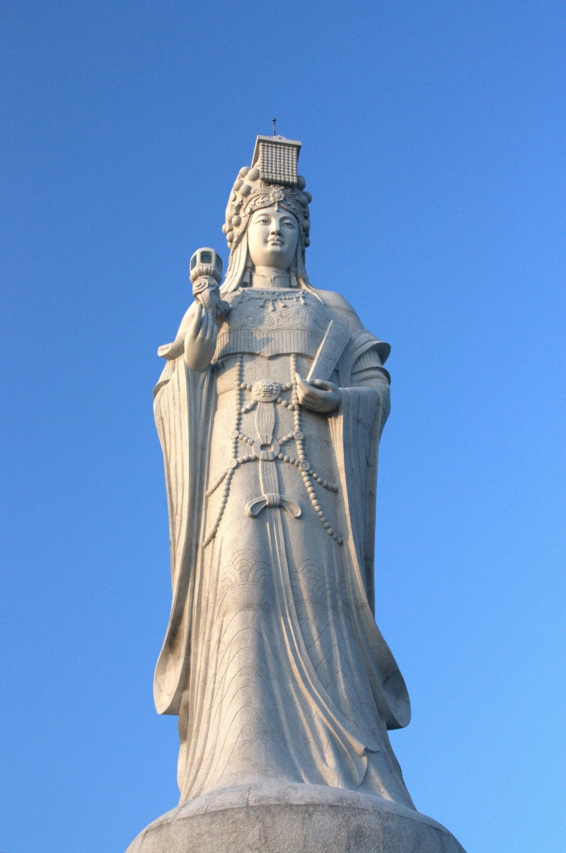 sculpture, male likeness, Stone, Matsu, statue, coastal, blue, salvation, faith, no people, gentle, art and craft, low angle view, architecture, China
