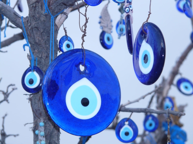 Amulet, counterspell, jewel, multi colored, focus on foreground, art and craft, evil, Look, 2K, souvenir, close-up, design, tree, daytime, trailers, group of objects