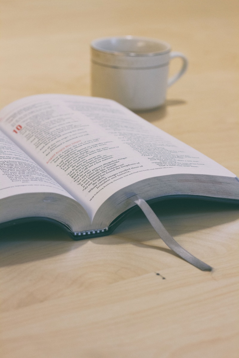 indoors, coffee cup, paper, top, beside, selective, close-up, textbook, bookmark, still life, surface, open, book, opened, cup, selective focus, publication
