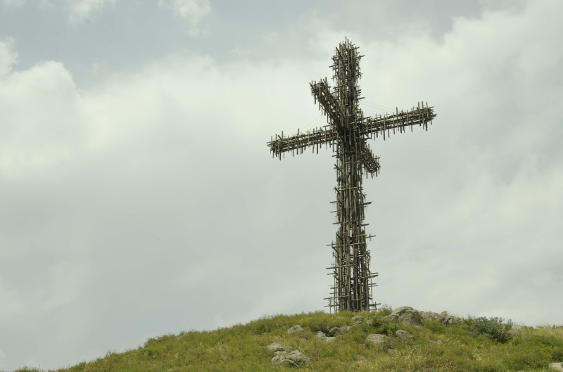 holy, catholic, fuel and power generation, communication, outdoors, global communications, tree, day, religion, no people, christ, church, faith, green color