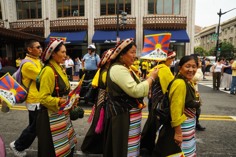 architecture, his holiness the great 14th dalai lama birthday peace parade, group, built structure, person, clothing, head-dress of pearl, arts culture and entertainment