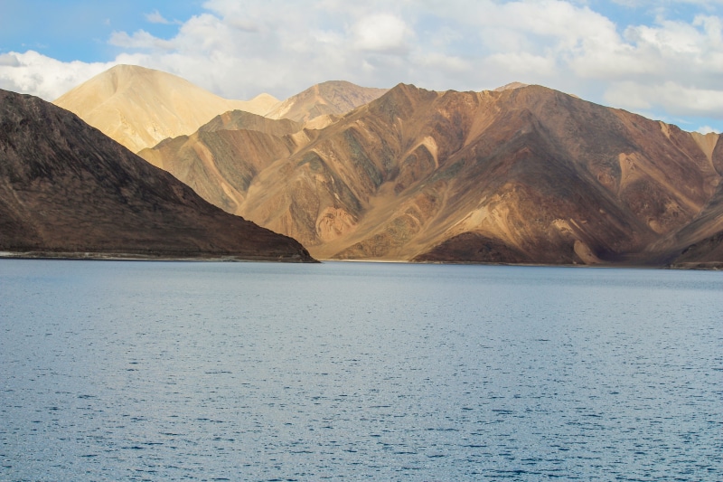 landscape, formation, sky, ladakh, beauty in nature, tranquility, mountain peak, outdoors, mountain, mountain range, non-urban scene, waterfront, idyllic