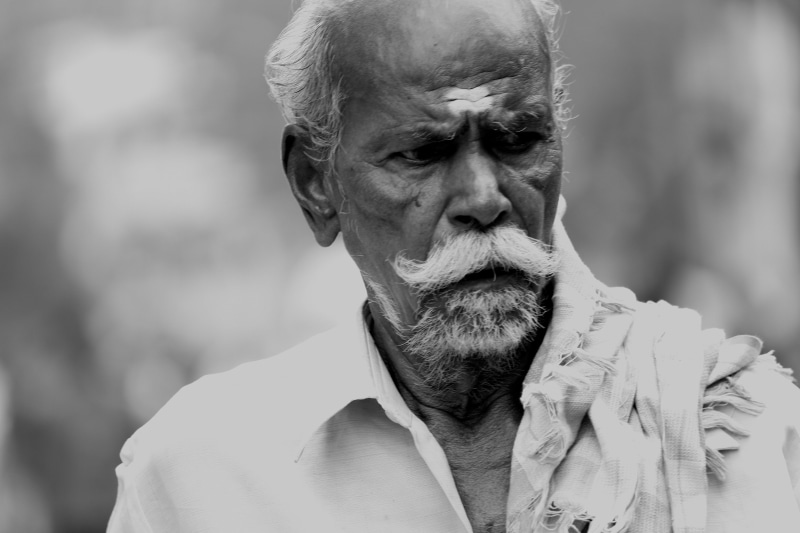 vishnu vasu, culture, focus on foreground, hindu priest, contemplation, real people, sri lanka, gandhi, males, senior, faith, front view, buddha, senior adult