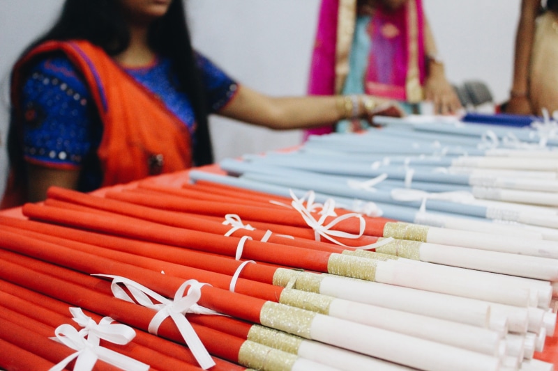 real people, adult, one person, color, celebration, indoors, 2K, festival, focus on foreground, hindi, multi colored, standing, cultural, art and craft