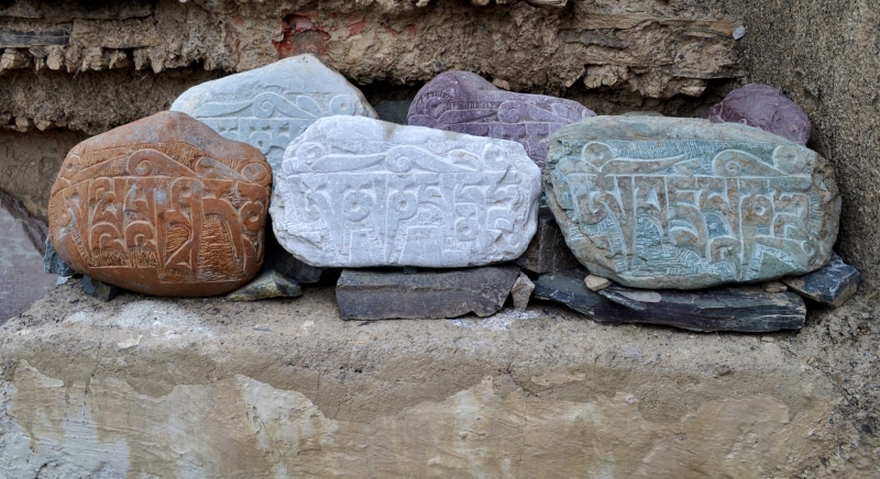 religious, indoors, stone material, history, traditional, fragments, landmark, symbol, close-up, text, assorted, ancient civilization, asian, craft, spiritual