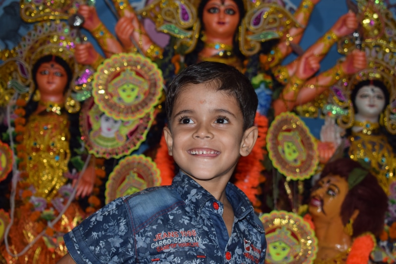 males, child, headshot, teeth west bengal, portrait, incidental people, indoors, men, people, children, looking at camera, 5K, smiling, celebration, boys