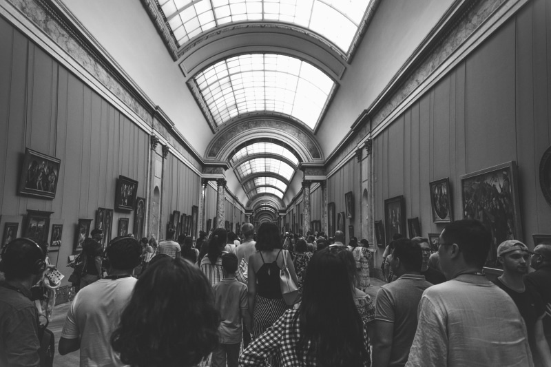 street, inside, leisure activity, real people, road, france, men, indoors, monochrome, alleyway, built structure, people, building, adult, town, paris