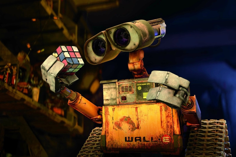 close-up, working, one person, WALL-E, night, indoors, standing, helmet, toy, business, holding, transportation, occupation, focus on foreground, industry