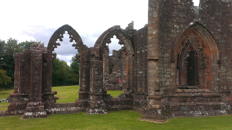 sky, travel destinations, damaged, church ruins, arch, abbey, no people, decay, old building, nature, outdoors, arches, day, the past, stones, masonry