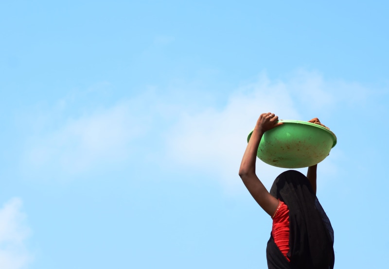red, healthy eating, outdoors, cloud - sky, food, colors, one person, lifestyles, green, black, sky, apple - fruit, freshness, travel, obscured face, food and drink