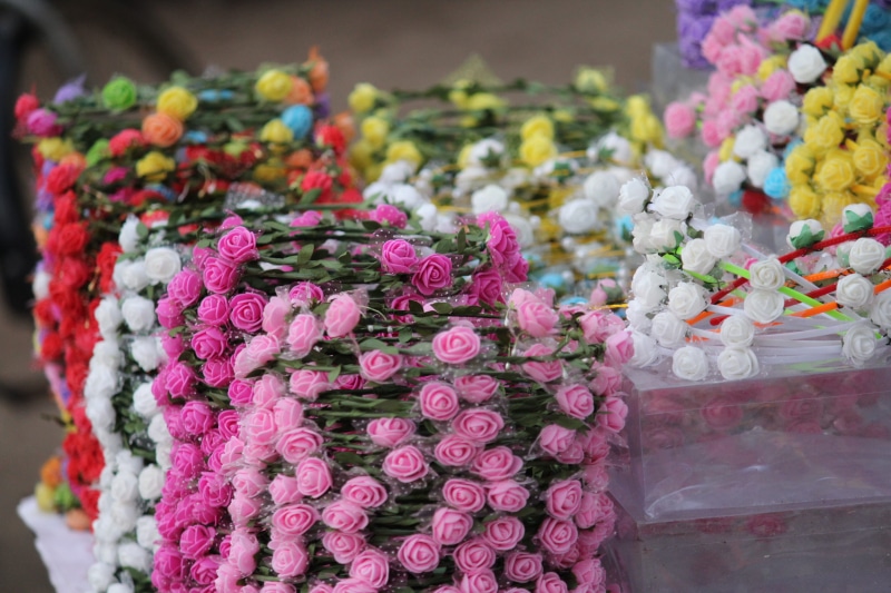 beauty in nature, flower head, large group of objects, freshness, no people, pink color, outdoors, fragility, decoration, for sale, close-up, plant, flowering plant
