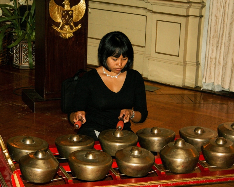 lifestyles, 2K, females, standing, real people, one person, Woman, smiling, Music, asian Ethnicity, entertainment, home interior, only women, embassy of indonesia