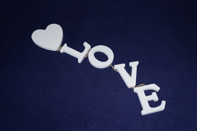 studio shot, emotion, directly above, still life, affection, close-up, cut out, business, romance, 5K, background, feelings, love, white color, black background