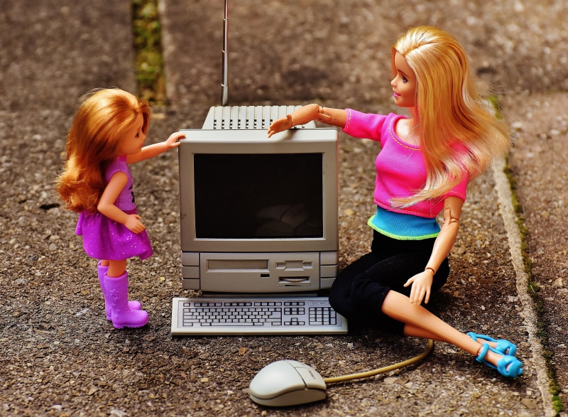 smiling, technology, playing, sister, enlightenment, enlighten, real people, two people, women, togetherness, facebook, social networking, lifestyles, security
