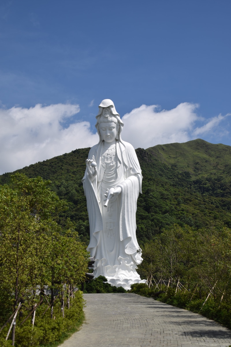 guanyin bodhisattva, art and craft, plant, sky, sculpture, goddess, buddi, non-urban scene, statue, Guanyin, outdoors, representation, 5K, religion, female likeness