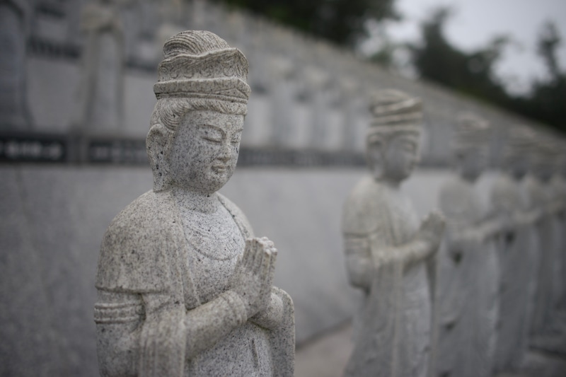 zen, religion, focus on foreground, craft, human representation, no people, sculpture, architecture, spirituality, male likeness, guanyin, solid, close-up