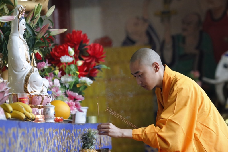 religion, spirituality, monks, zheng guanyin temple, males, waist up, indoors, flower, bouquet, flowering plant, side view, 4K, plant, buddhism, shaved head