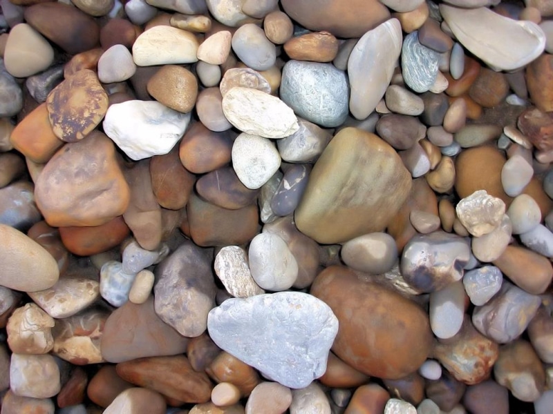 stone, day, large group of objects, structure, backgrounds, rock - object, rock, full frame, pattern, beach, surface, no people, stones, texture, background