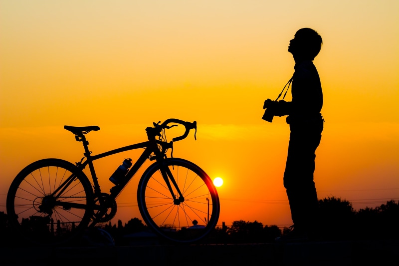 lifestyles, mode of transportation, happy, silhouette, standing, adult, the sun, bike, sky, people, queen s, happiness, life, two, side view, activity