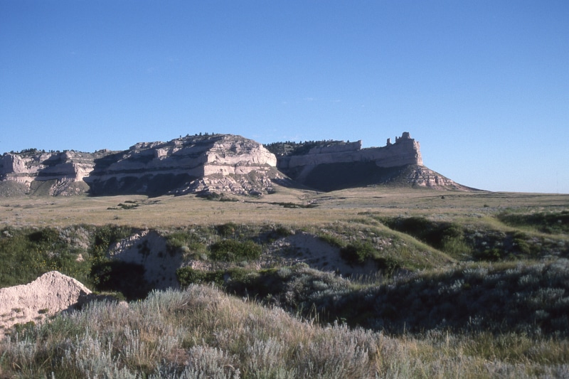 rock, scenics - nature, outdoors, non-urban scene, nebraska, beauty in nature, clear sky, rock - object, united states, scottsbluff, rock formation, grass