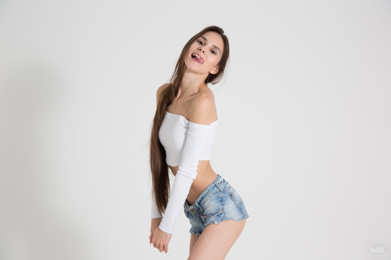 long hair, Leona Mia, blouse, white background, jeans, Watch4Beauty, thin, tongue out, brown eyes, 5K, women, brunette, shorts