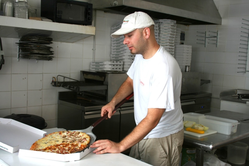 Pizza, working, box, food and drink, bakery, waist up, italian food, preparing food, occupation, pizzero, bring food, indoors, Pizza, uniform, holding